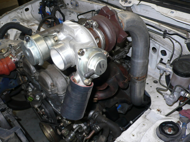 Illustration for article titled Eyesore Racing's Ghettocharged Miata Fears No Turbocharged Peugeot Surrender Monkeys!